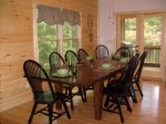 The large dining table will seat 8 guests.